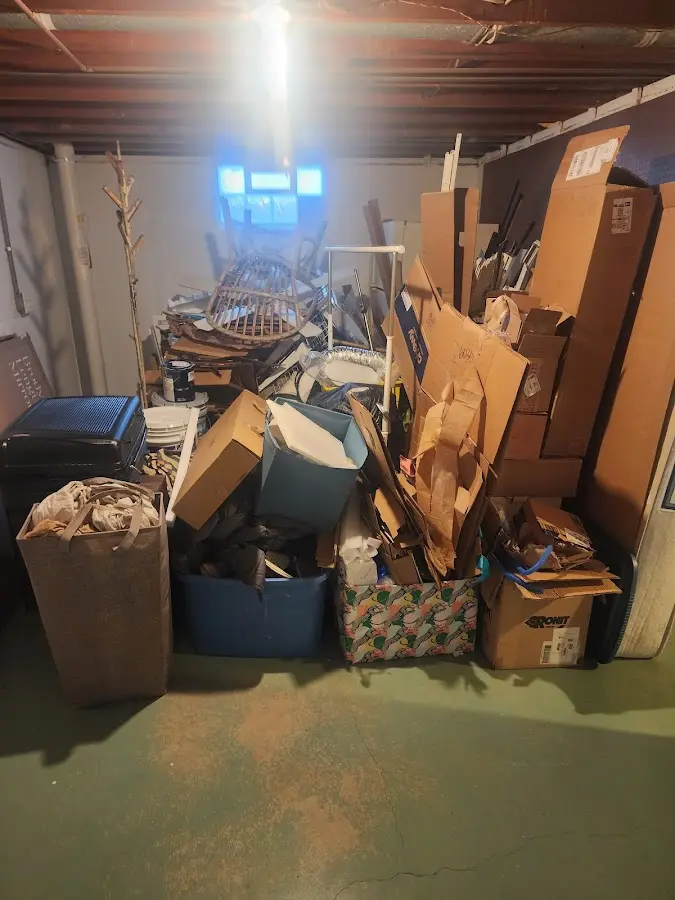 Roll-off dumpster container at job site for 4 Yard Dumpster Rental in Roswell